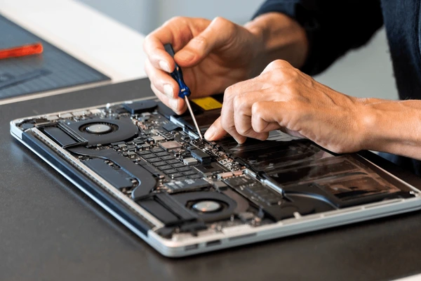 Laptop repair in progress at Prince Mobile Service Centre Keshavpura Kota